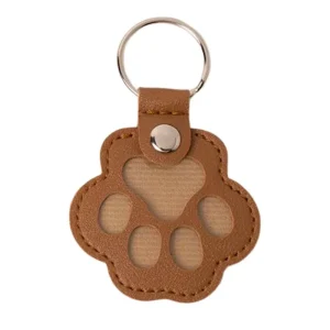 <strong>Guau!</strong> Llavero Guardapelos en Forma de Patita, Color Café